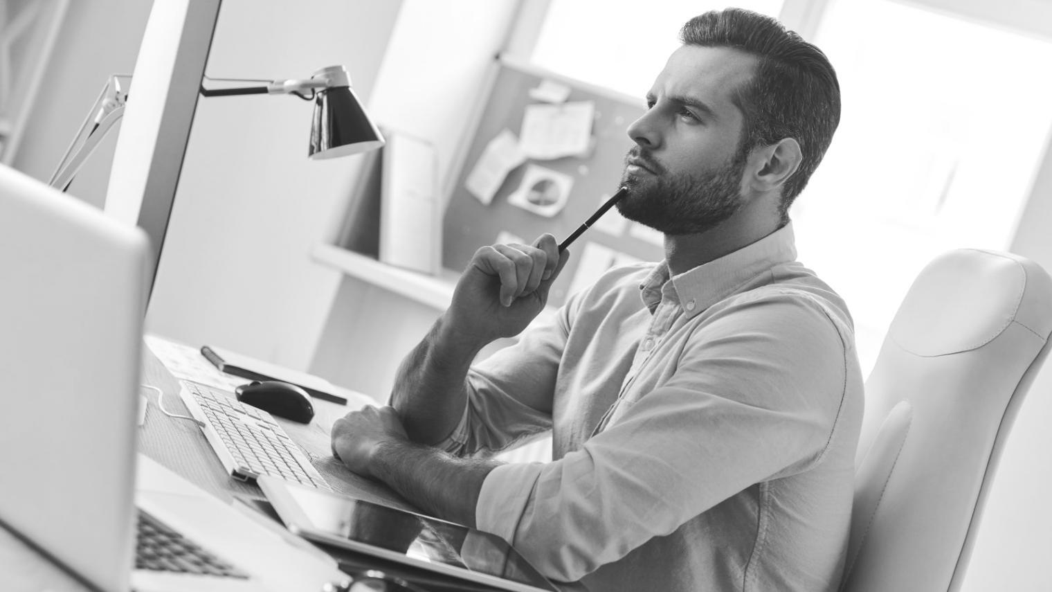 Client working through a financial model on screen with mentor support